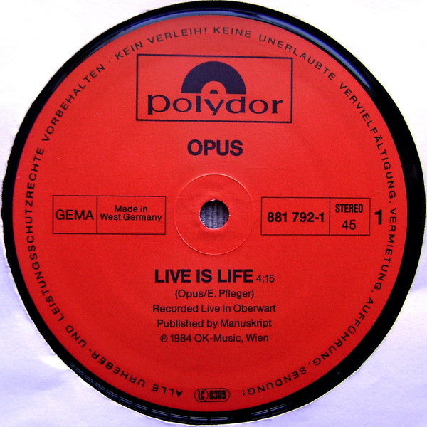 Opus – Live Is Life (NM, FUNDA EX) BOX36