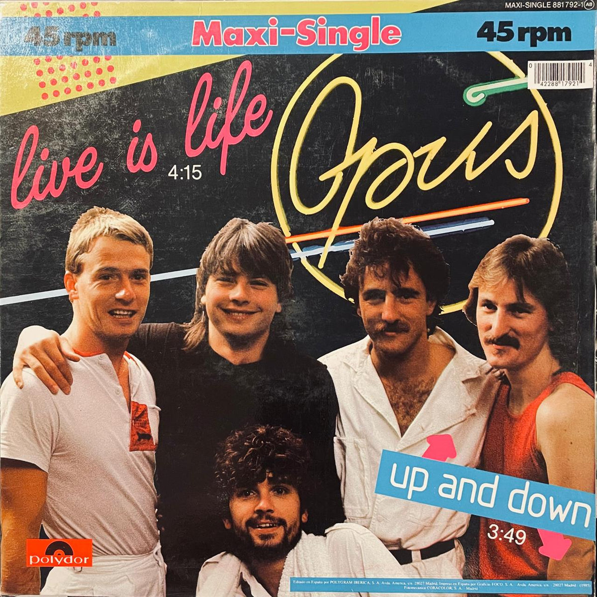 Opus – Live Is Life (NM, FUNDA EX) BOX6