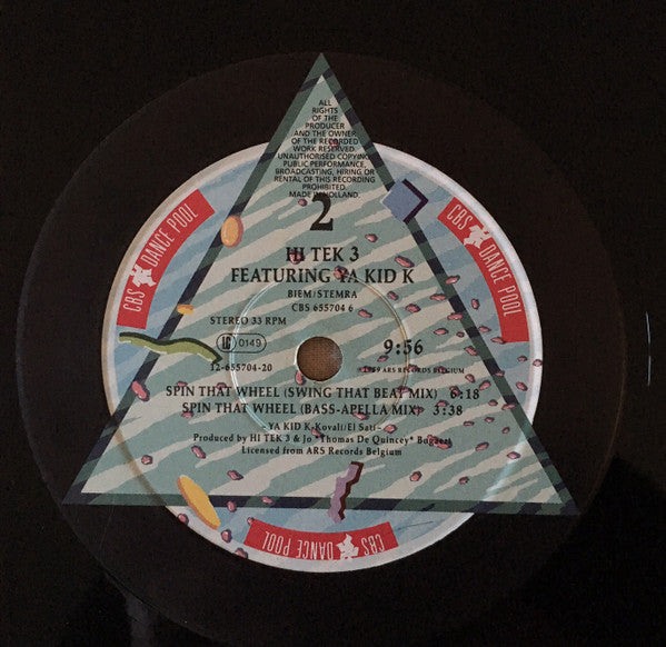 Hi Tek 3 Featuring Ya Kid K – Spin That Wheel (NM, FUNDA EX) BOX7