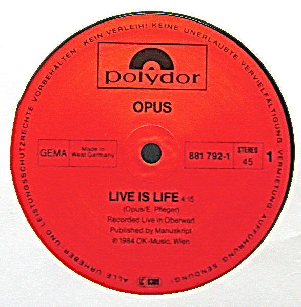 Opus – Live Is Life (NM) BOX7