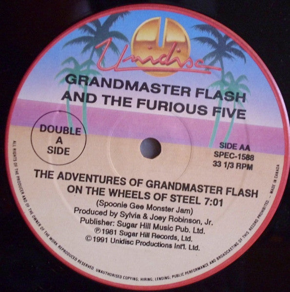 Kurtis Blow / Grandmaster Flash & The Furious Five – The Breaks / The Adventures Of Grandmaster Flash On The Wheels Of Steel (VG+) BOX27