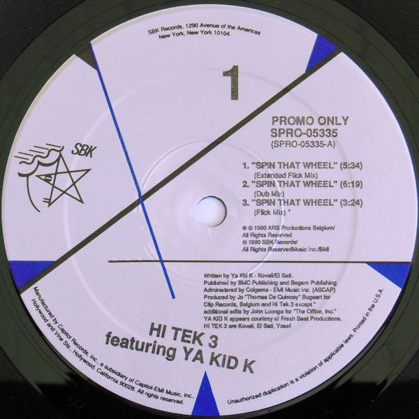 Hi Tek 3 Featuring Ya Kid K – Spin That Wheel (VG+, Funda Generic) Box21
